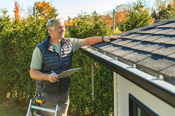 Professional Roof Repair technician working in Huron, SD